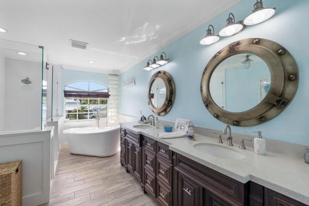 Bathroom, Dual Sink Vanities, Free Standing Baths, Glass Shower, Interior, Recessed Lighting, Wood Texture Flooring
