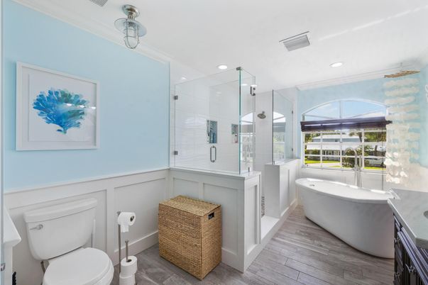 Bathroom, Free Standing Baths, Glass Shower, Interior, Recessed Lighting, Wood Texture Flooring