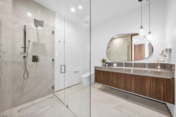 Bathroom, Dual Sink Vanities, Glass Shower, Interior, Pendant Lights, Recessed Lighting