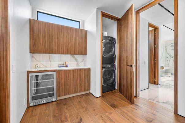 Bathroom, Interior, Marble, Marble Walls, Utility Closets, Washer, Wood Texture Flooring