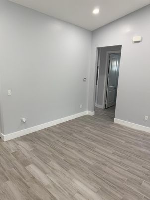 Elevator, Empty room, Interior, Recessed Lighting, Wood Texture Flooring