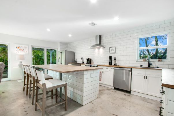 Interior, Kitchen, Recessed Lighting, Stainless Steel Appliances, Stone Walls