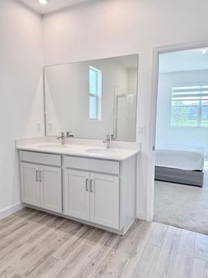 Bathroom, Dual Sink Vanities, Interior, Recessed Lighting, Wood Texture Flooring