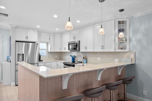 Interior, Kitchen, Pendant Lights, Recessed Lighting, Stainless Steel Appliances, Wood Texture Flooring