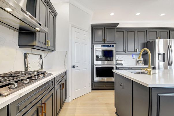 Interior, Kitchen, Marble Walls, Recessed Lighting, Stainless Steel Appliances, Wood Texture Flooring