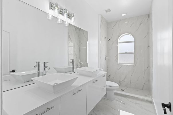 Bathroom, Dual Sink Vanities, Interior, Marble, Marble Walls, Recessed Lighting