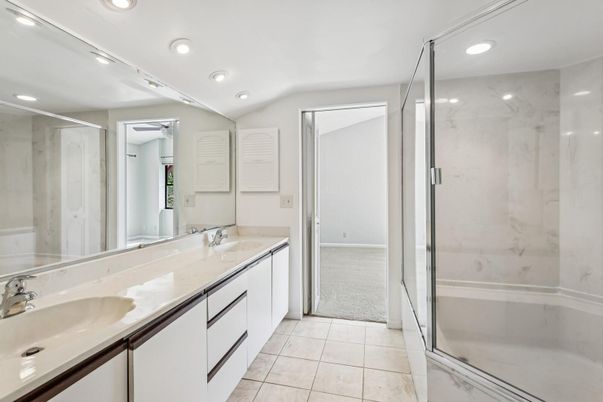 Bathroom, Dual Sink Vanities, Glass Shower, Interior, Marble Walls, Recessed Lighting