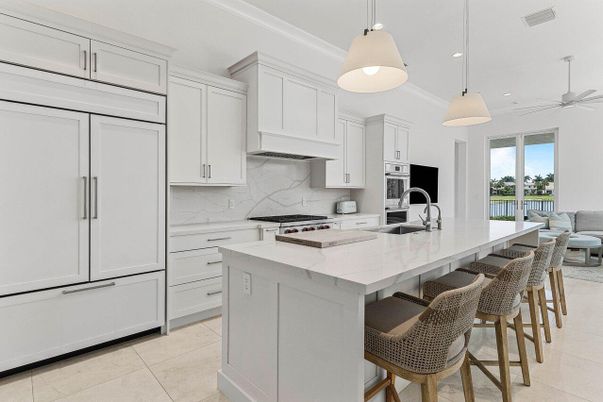 Interior, Kitchen, Marble Walls, Pendant Lights, Recessed Lighting, Stainless Steel Appliances