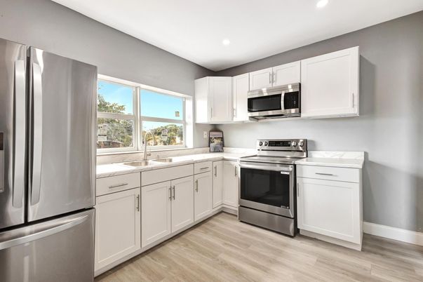 Interior, Kitchen, Recessed Lighting, Stainless Steel Appliances, Wood Texture Flooring