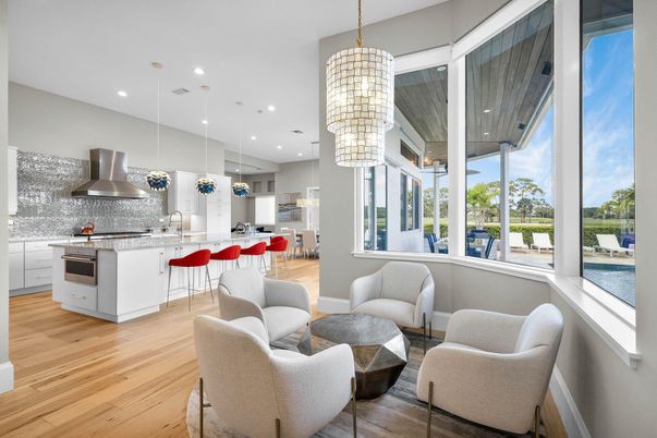 Dining room, Interior, Kitchen, Living room, Pendant Lights, Recessed Lighting, Stainless Steel Appliances, Water, Wood Texture Flooring