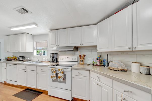 Interior, Kitchen, Tile Countertops, Wood Texture Flooring