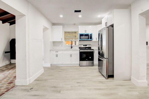 Interior, Kitchen, Recessed Lighting, Stainless Steel Appliances, Wood Texture Flooring