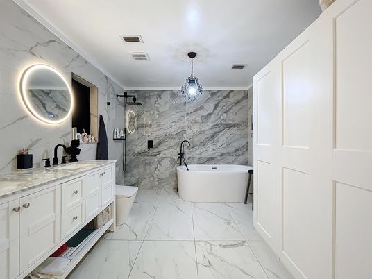 Bathroom, Dual Sink Vanities, Free Standing Baths, Interior, Marble, Marble Walls, Pendant Lights