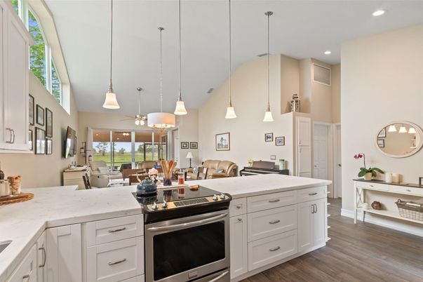 Dining room, Interior, Kitchen, Living room, Pendant Lights, Recessed Lighting, Stainless Steel Appliances, Wood Texture Flooring