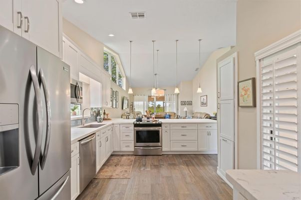 Interior, Kitchen, Pendant Lights, Recessed Lighting, Stainless Steel Appliances, Wood Texture Flooring