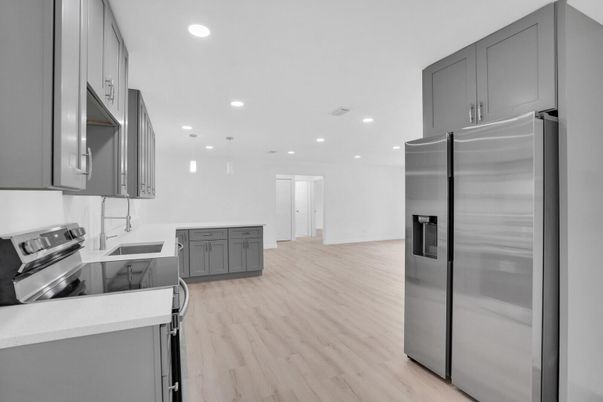 Interior, Kitchen, Recessed Lighting, Stainless Steel Appliances, Wood Texture Flooring