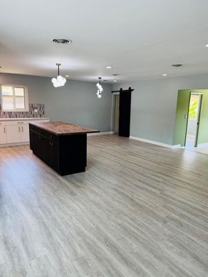 Empty room, Interior, Kitchen, Pendant Lights, Recessed Lighting, Wood Texture Flooring
