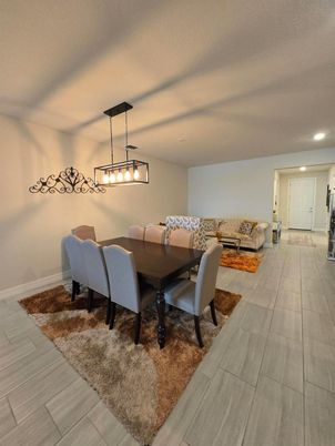 Dining room, Interior, Living room, Pendant Lights, Recessed Lighting, Wood Texture Flooring