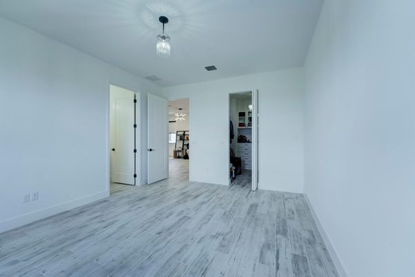 Empty room, Interior, Pendant Lights, Wood Texture Flooring