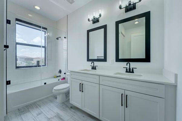 Bathroom, Dual Sink Vanities, Glass Shower, Interior, Recessed Lighting, Wood Texture Flooring