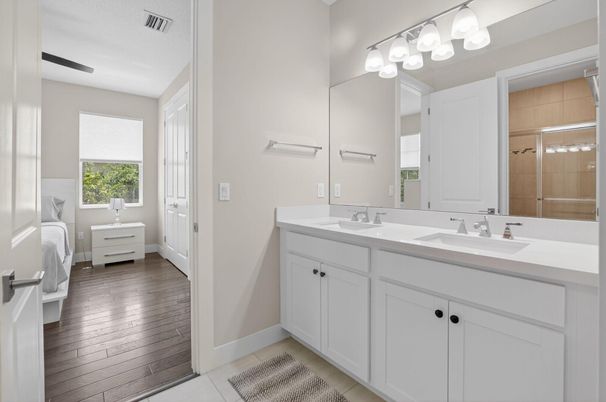 Bathroom, Dual Sink Vanities, Glass Shower, Interior, Wood Texture Flooring