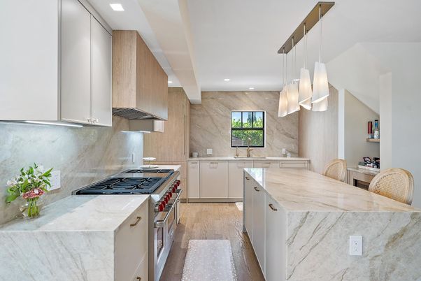 Interior, Kitchen, Marble Walls, Pendant Lights, Recessed Lighting, Stainless Steel Appliances, Wood Texture Flooring