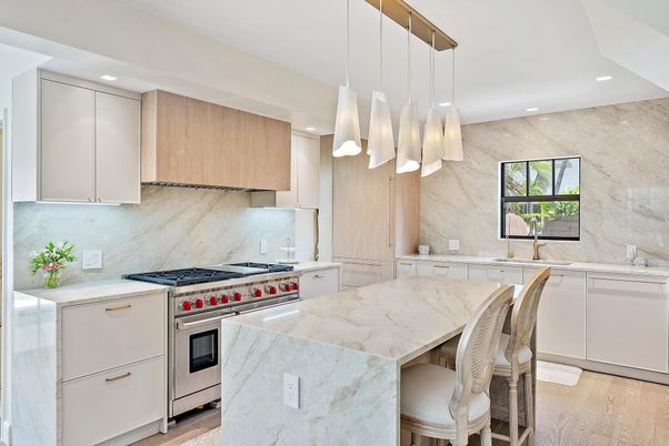 Interior, Kitchen, Marble Walls, Pendant Lights, Recessed Lighting, Stainless Steel Appliances, Wood Texture Flooring