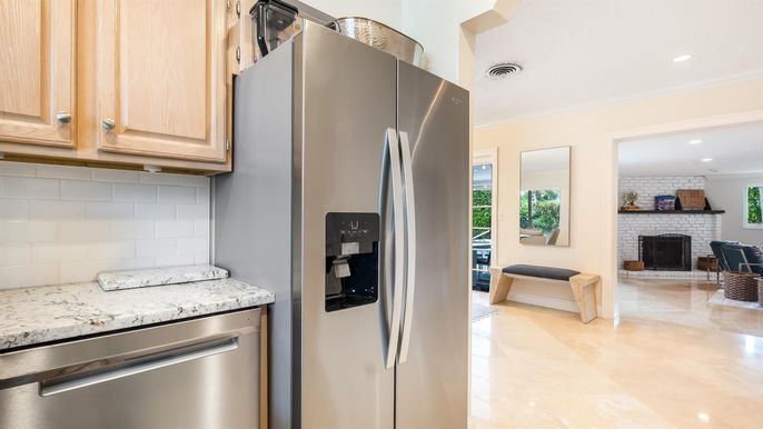 Fireplace, Interior, Kitchen, Recessed Lighting, Stainless Steel Appliances, Stone Walls
