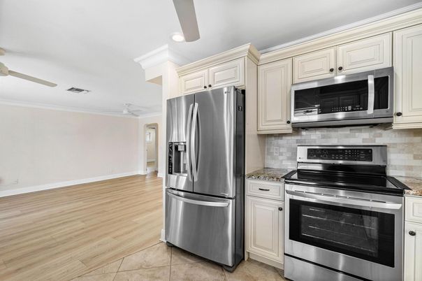 Interior, Kitchen, Recessed Lighting, Stainless Steel Appliances, Wood Texture Flooring