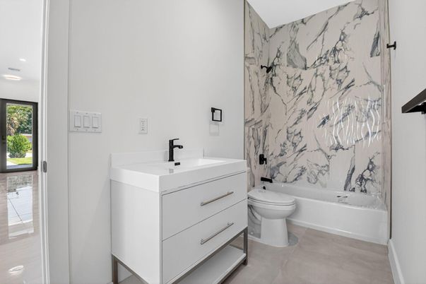 Bathroom, Dual Sink Vanities, Interior, Marble Walls, Recessed Lighting