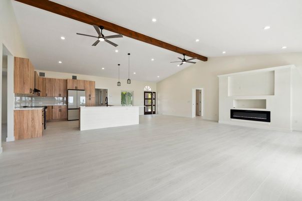 Empty room, Fireplace, Interior, Kitchen, Pendant Lights, Recessed Lighting, Wooden Beams, Wood Texture Flooring