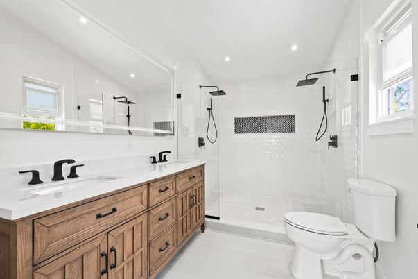 Bathroom, Dual Sink Vanities, Glass Shower, Interior, Recessed Lighting, Wood Texture Flooring