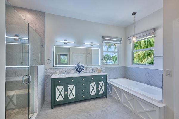 Bathroom, Dual Sink Vanities, Glass Shower, Interior, Marble, Marble Walls, Pendant Lights