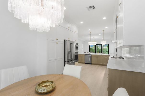Chandelier, Dining room, Interior, Kitchen, Pendant Lights, Recessed Lighting, Stainless Steel Appliances, Wood Texture Flooring