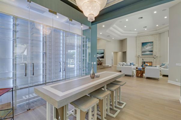 Chandelier, Dining room, Fireplace, Interior, Living room, Recessed Lighting, Wood Texture Flooring