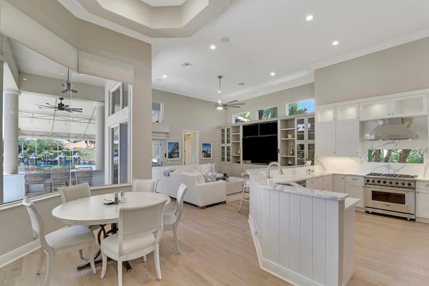 Dining room, Interior, Kitchen, Living room, Pendant Lights, Recessed Lighting, Stainless Steel Appliances, Wood Texture Flooring