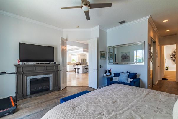 Bedroom, Fireplace, Interior, Recessed Lighting, Wood Texture Flooring