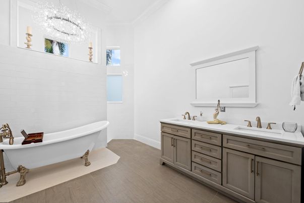 Bathroom, Chandelier, Dual Sink Vanities, Free Standing Baths, Interior, Wood Texture Flooring
