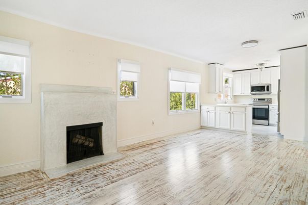 Fireplace, Interior, Kitchen, Stainless Steel Appliances, Wood Texture Flooring