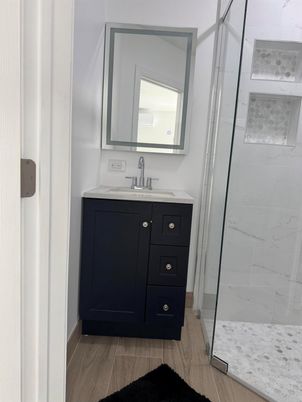 Bathroom, Glass Shower, Interior, Marble Walls, Wood Texture Flooring