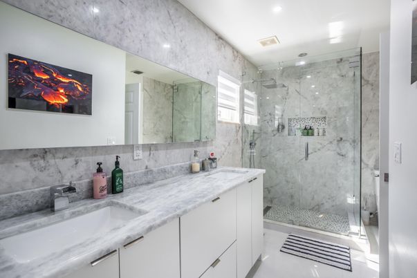 Bathroom, Dual Sink Vanities, Glass Shower, Interior, Marble Walls, Recessed Lighting