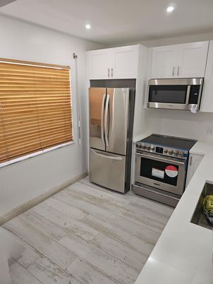 Interior, Kitchen, Recessed Lighting, Stainless Steel Appliances, Wood Texture Flooring