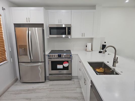 Interior, Kitchen, Marble, Recessed Lighting, Stainless Steel Appliances, Wood Texture Flooring