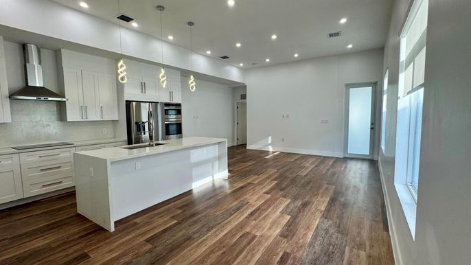 Interior, Kitchen, Pendant Lights, Recessed Lighting, Stainless Steel Appliances, Wood Texture Flooring