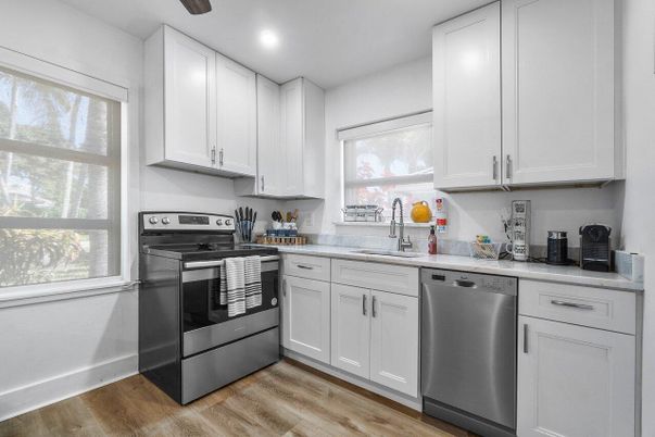 Interior, Kitchen, Recessed Lighting, Stainless Steel Appliances, Wood Texture Flooring
