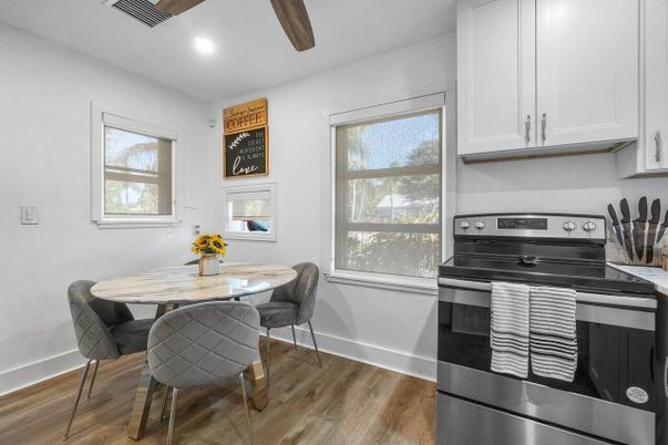 Dining room, Interior, Kitchen, Recessed Lighting, Stainless Steel Appliances, Wood Texture Flooring