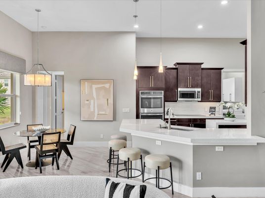 Dining room, Interior, Kitchen, Pendant Lights, Recessed Lighting, Stainless Steel Appliances, Wood Texture Flooring