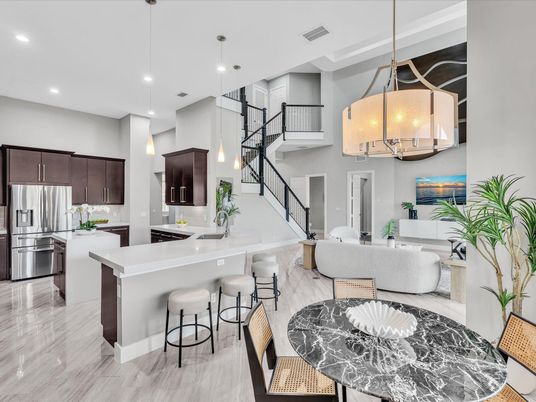 Chandelier, Dining room, Interior, Kitchen, Living room, Marble, Pendant Lights, Recessed Lighting, Stainless Steel Appliances