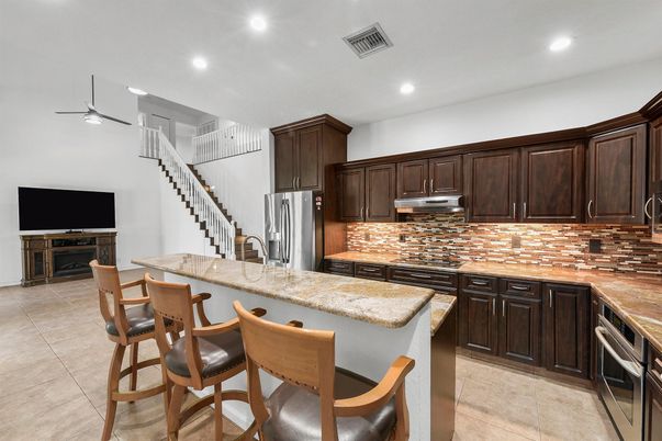 Fireplace, Interior, Kitchen, Recessed Lighting, Stainless Steel Appliances