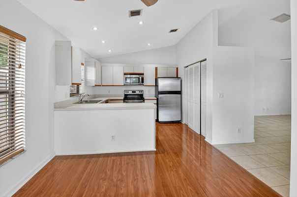 Interior, Kitchen, Recessed Lighting, Stainless Steel Appliances, Wood Texture Flooring